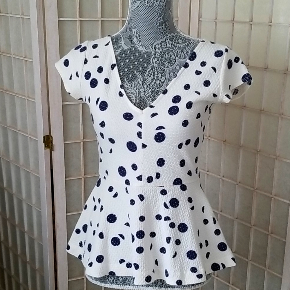 Poka dot peplum top
